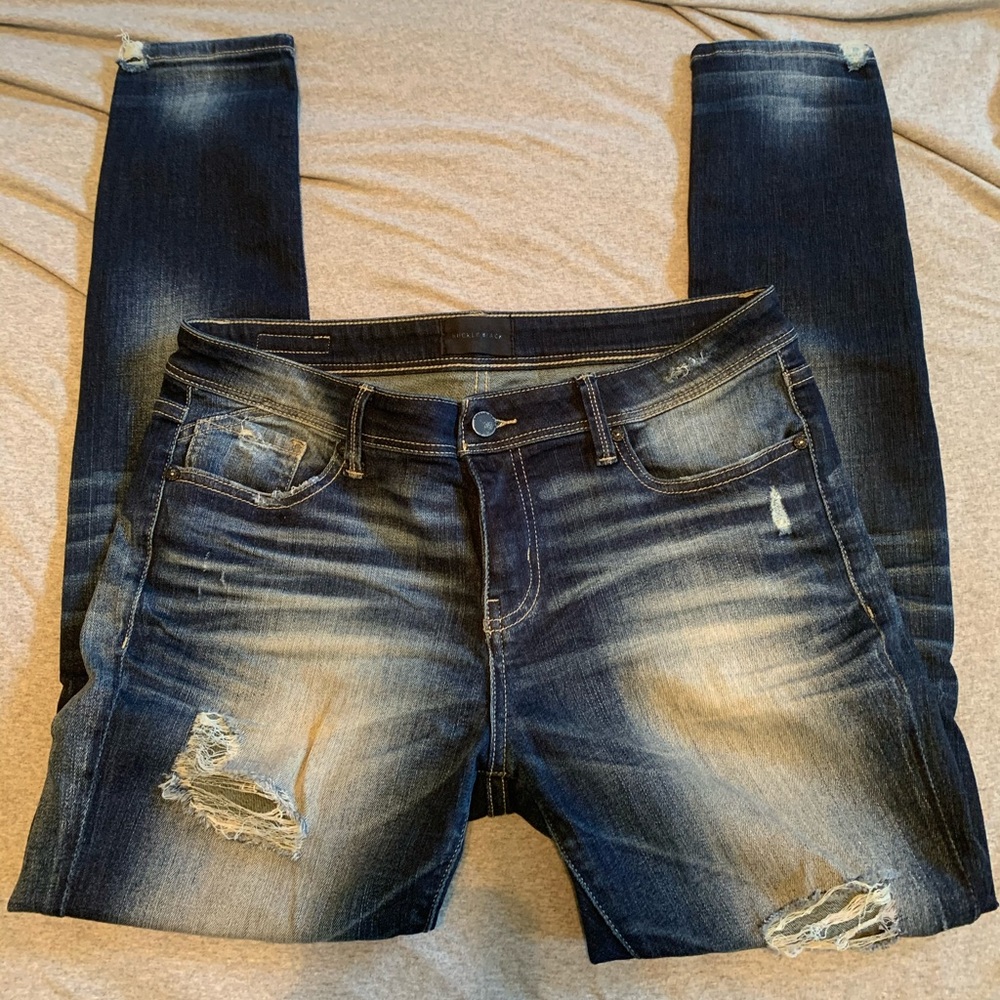 Buckle black skinny moto jeans